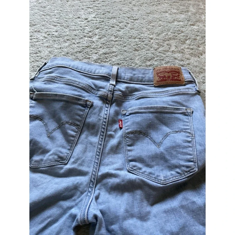 Levis 720 High Rise Super Skinny . Faded. Distressed. The Perfect Jean. So 26